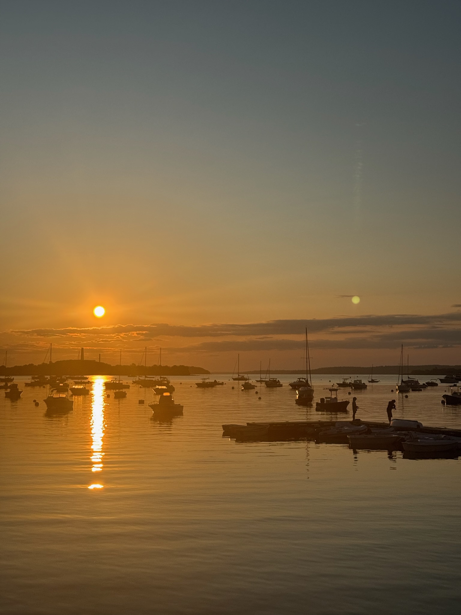 Golden sunset over Casco Bay harbor