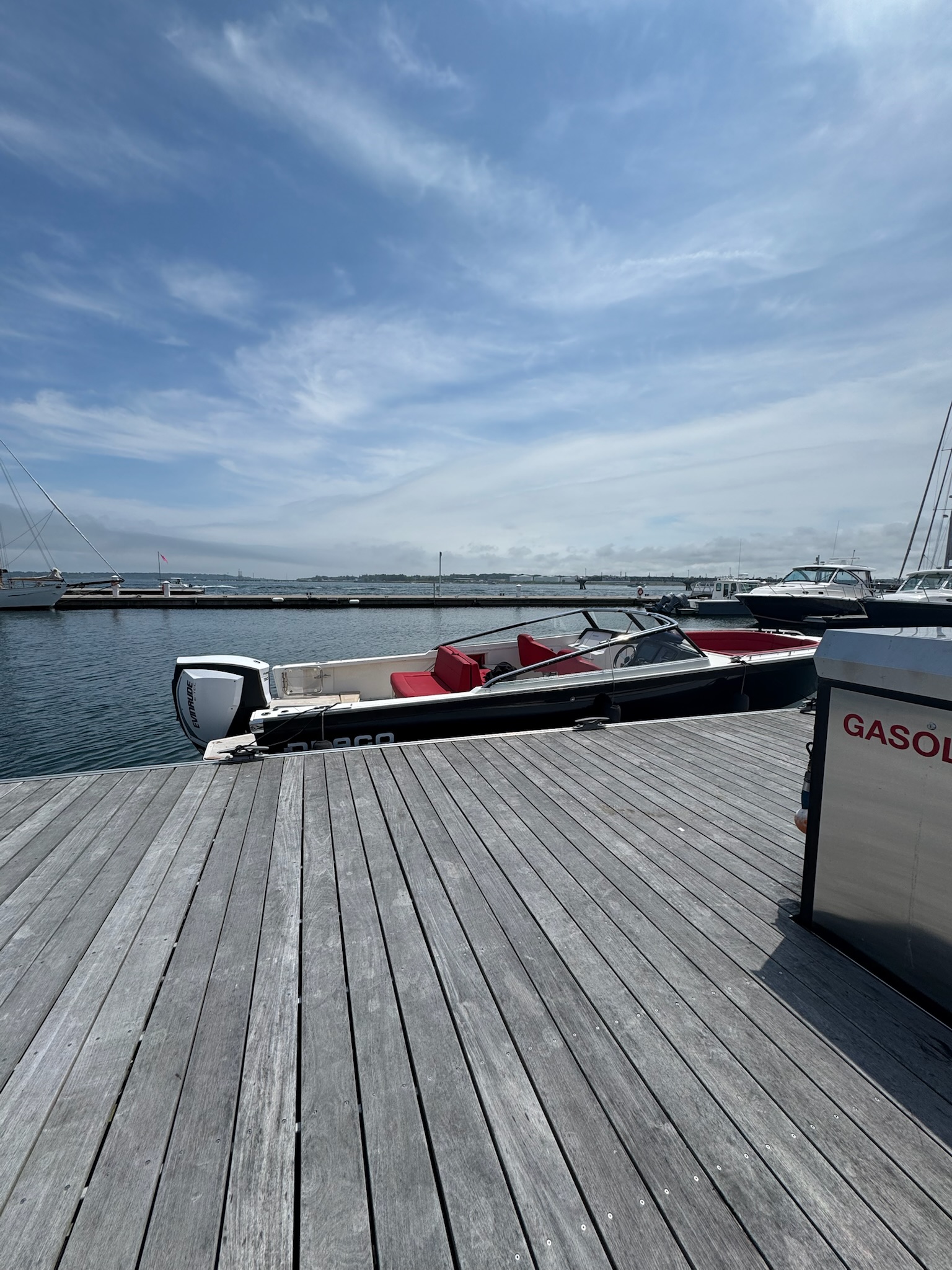 Draco at dock with red seats